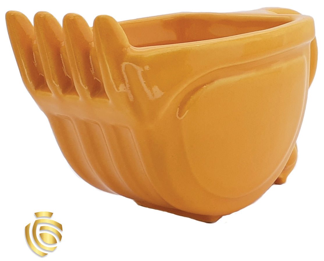 Taza excavadora amarilla con logo cat